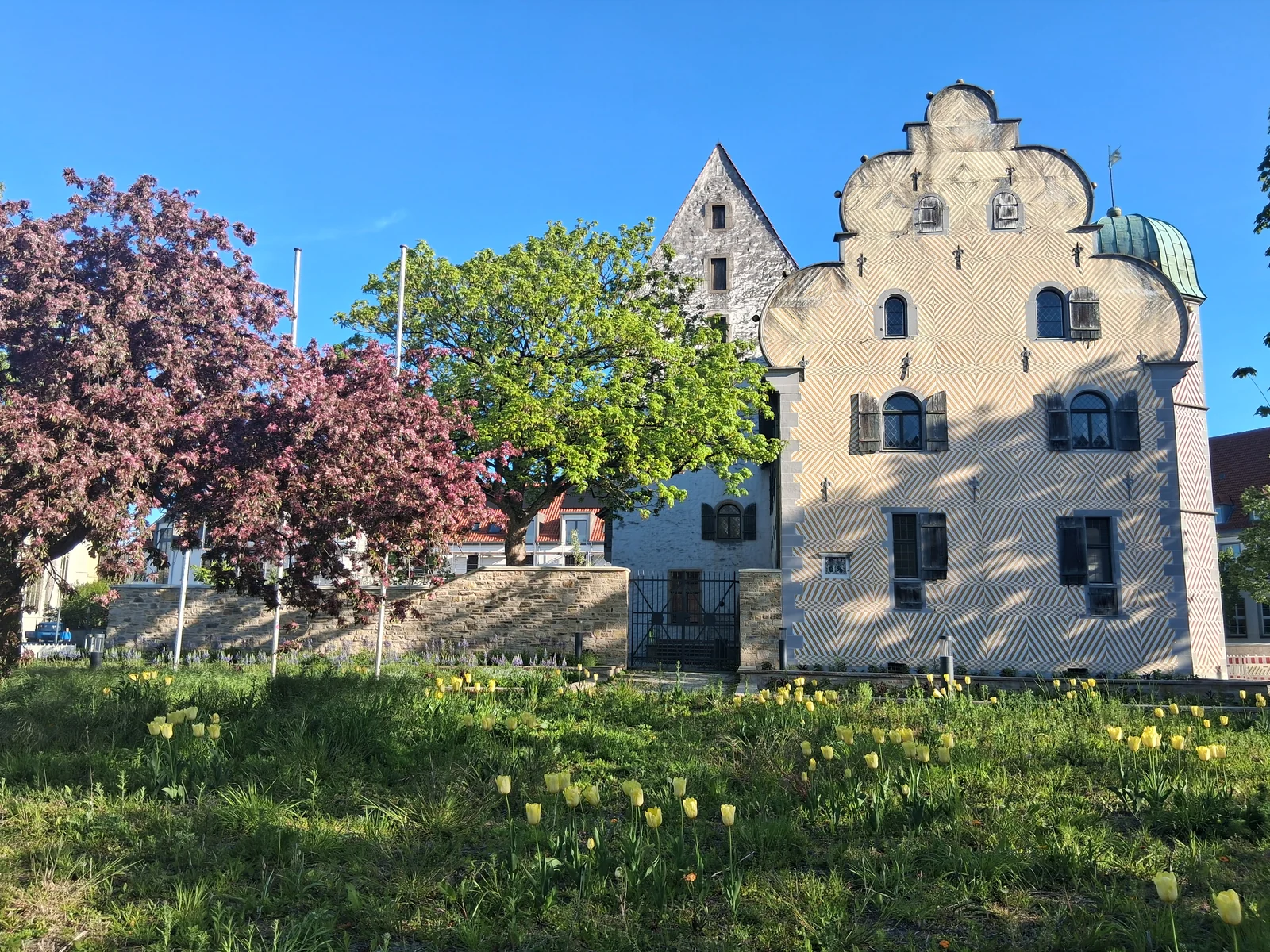 Historic Renaissance estate with blooming spring garden and tulips